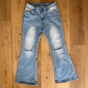 Light Wash Distressed Flare Jeans — Women